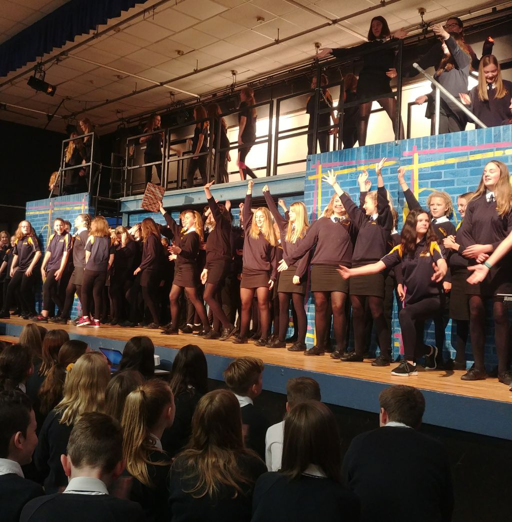 Students rehearsing for Our House - The Madness Musical