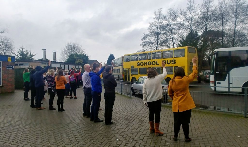 Staff wave off the students at the start of the Christmas holidays.