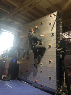 Students on climbing wall.