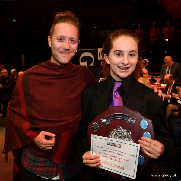 Rose with her award.