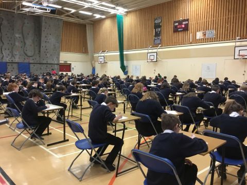 Students in the Sports Hall doing exams