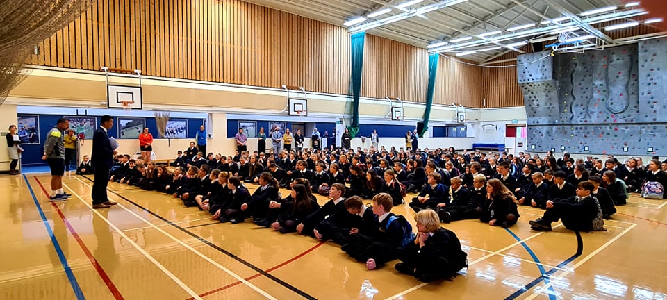 The new Year 7s with Mr Choi in the Sports Hall